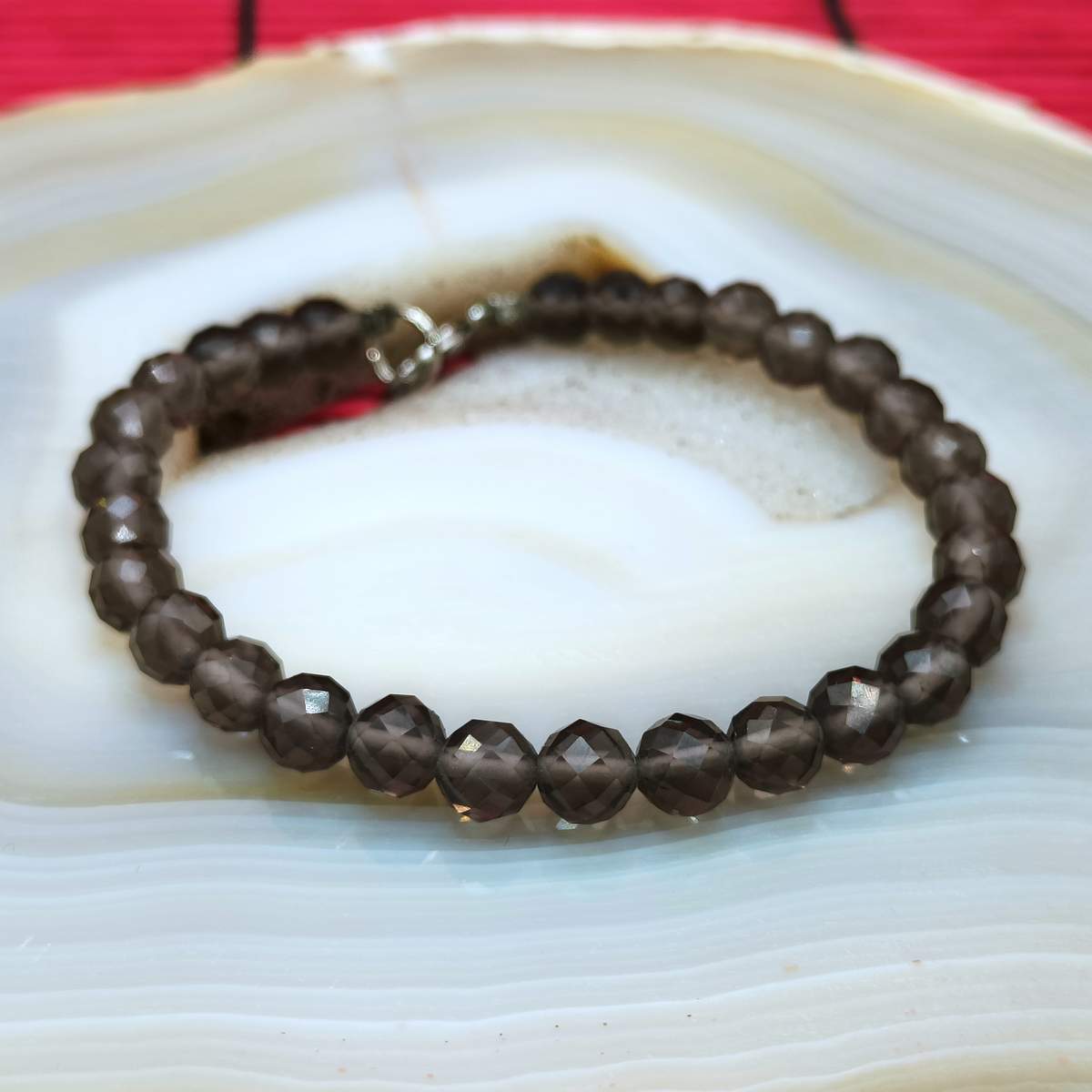 Браслет Раухтопаз огранка 6мм 0550