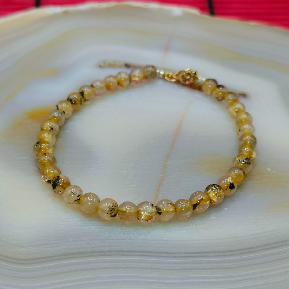 Браслет Кварц Рутиловий жовтий 4мм із застібкою 0900